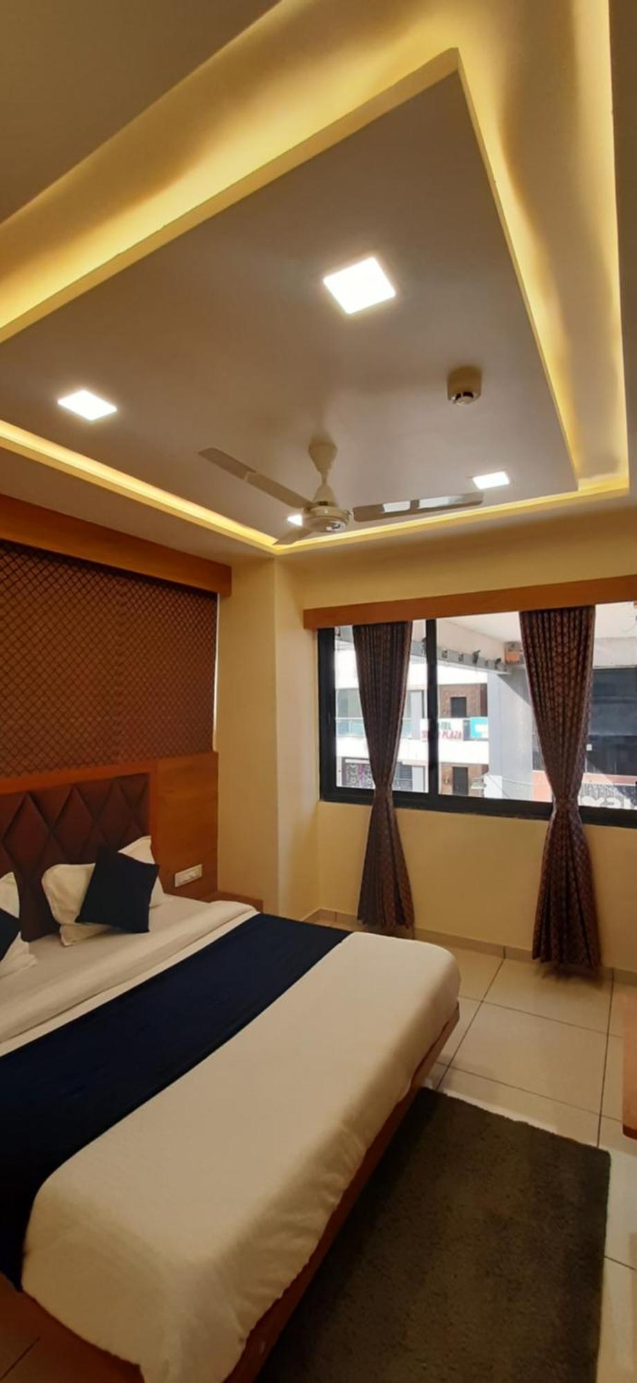 Hotel Suncity Ahmedabad Bilik gambar