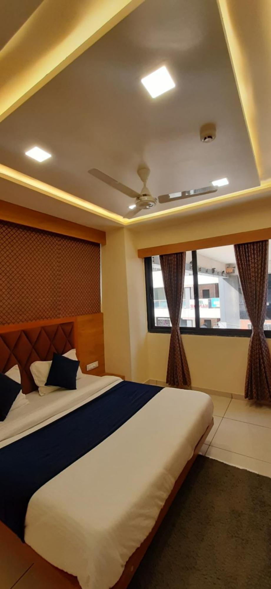Hotel Suncity Ahmedabad Bilik gambar