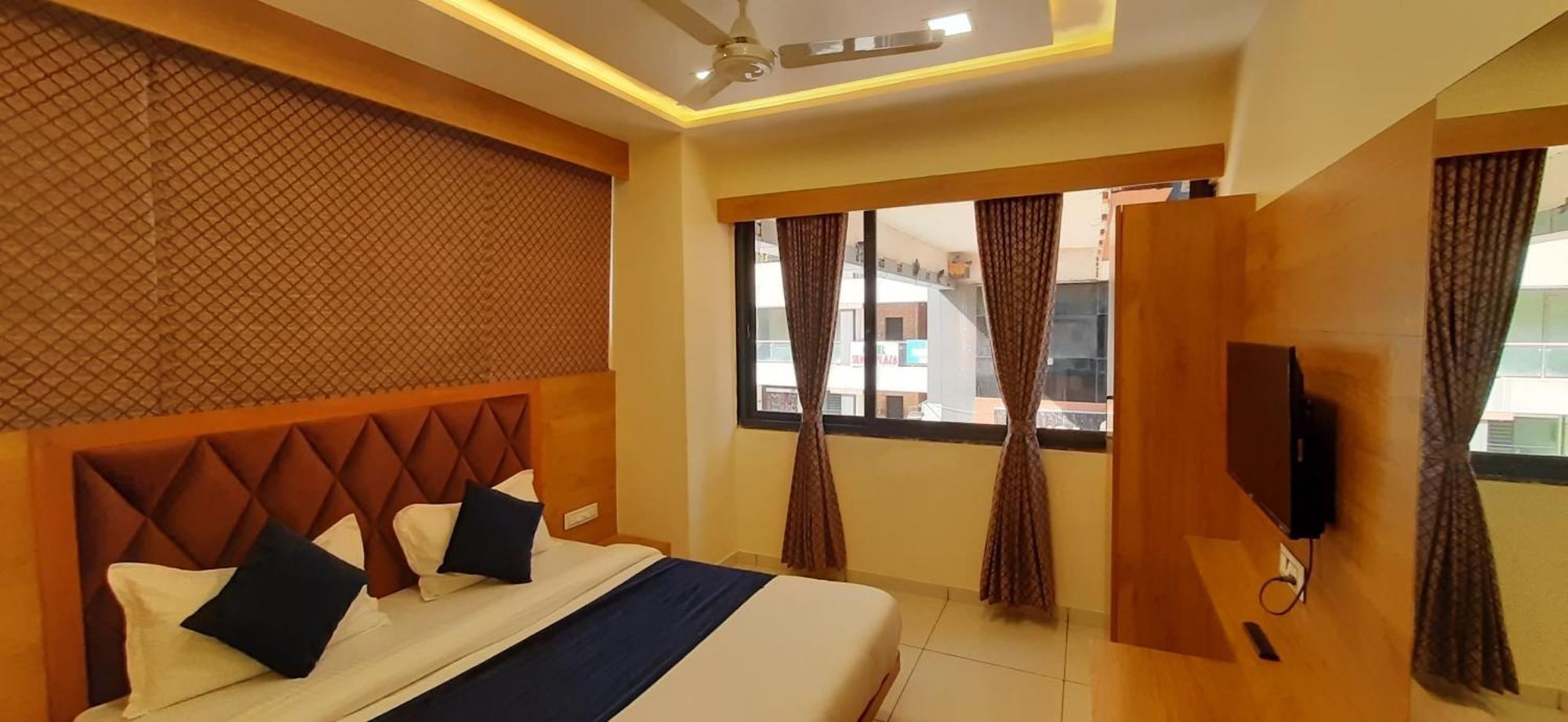 Hotel Suncity Ahmedabad Bilik gambar